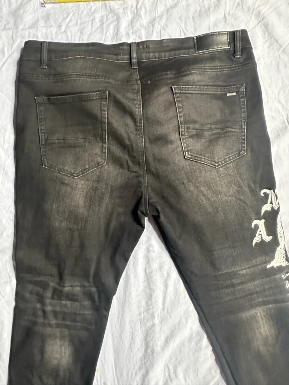 AMIRI Black Skinny Jeans with White Graphic Detailing - Men's - Picture 11 of 16